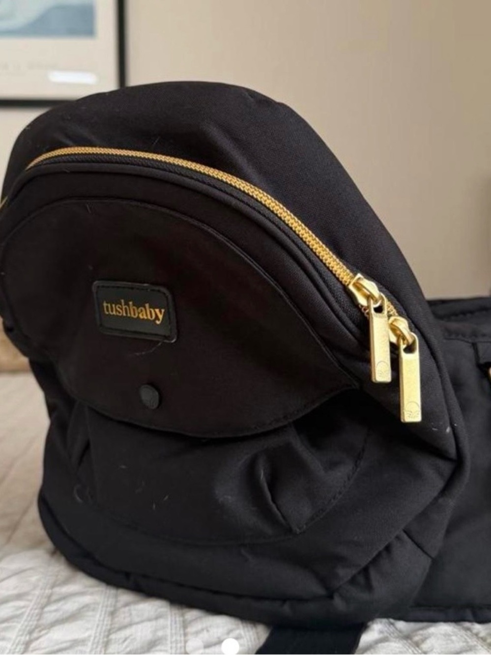 Black Tushbaby Baby Hip Bag with Gold Hardware